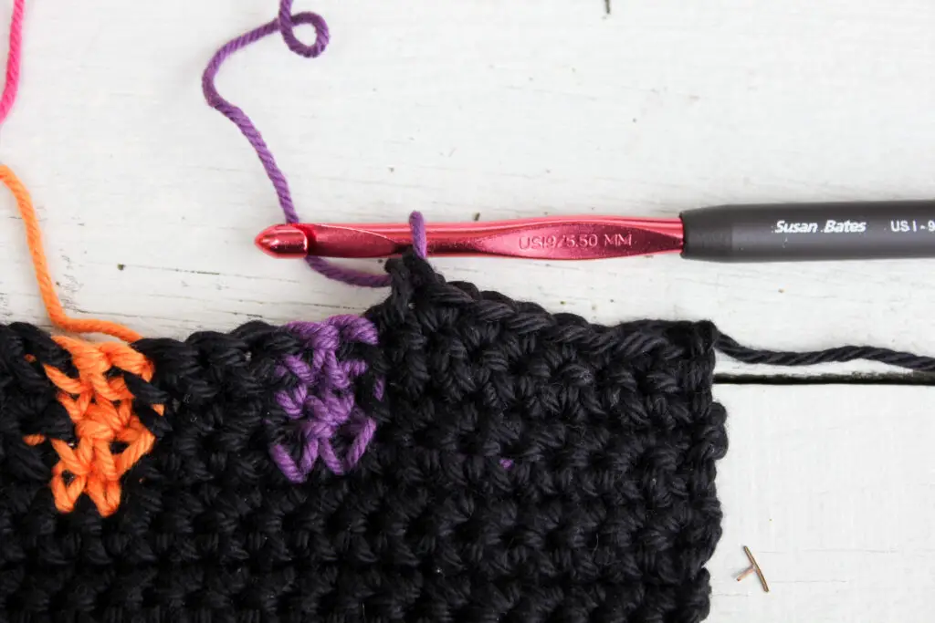 Complete the stitch with the new color.