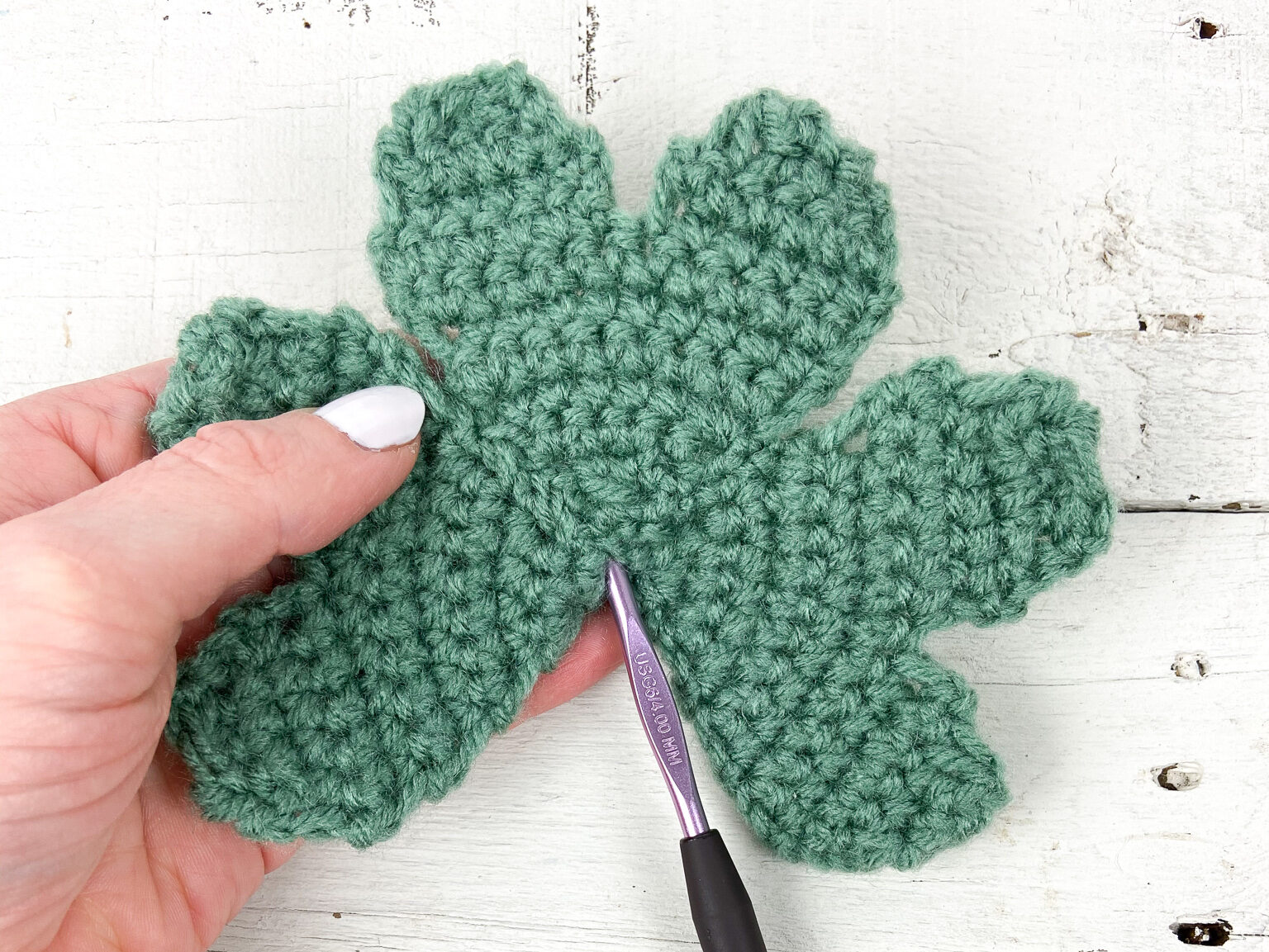 Insert hook to create shamrock stem